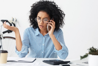 business woman getting angry on phone