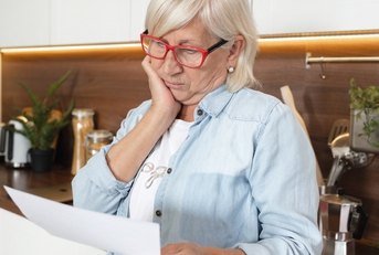 upset adult woman financially stressed