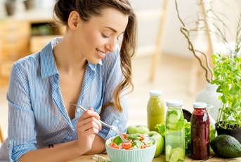 woman eating healthy salad