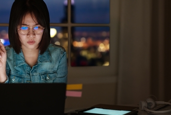 asian student sitting on desk