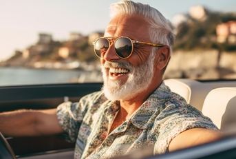senior man enjoying road trip