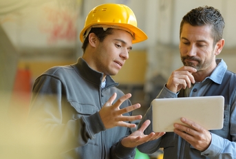 boss and worker checking results