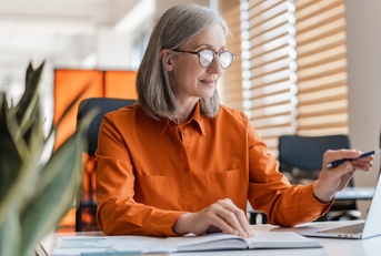 senior business woman working on laptop