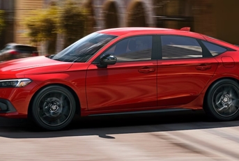 red honda civic on road