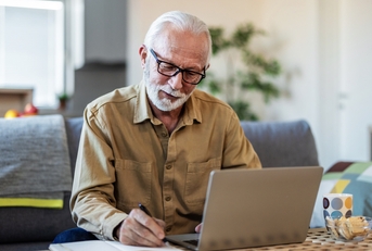 man with paperwork