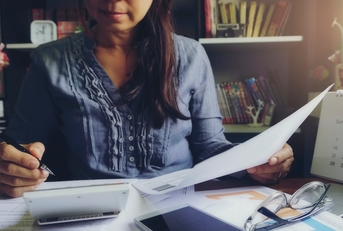 accountant calculating tax