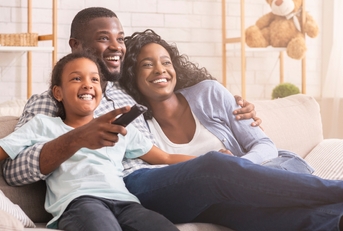 black family watching tv