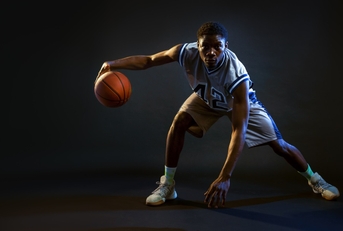 basketball player showing tricks with ball