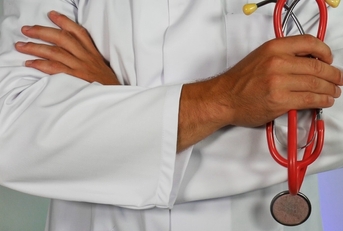 doctor in uniform with stethoscope