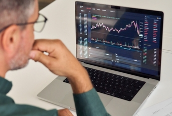 trader analyzing financial trading