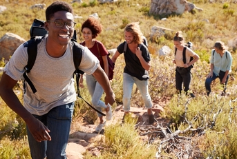 friends hiking single file