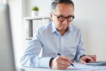 businessman with calculator