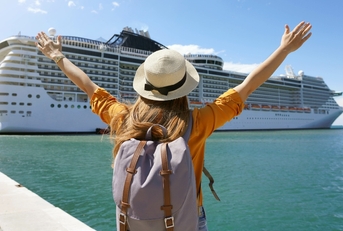 traveler girl with raised arms
