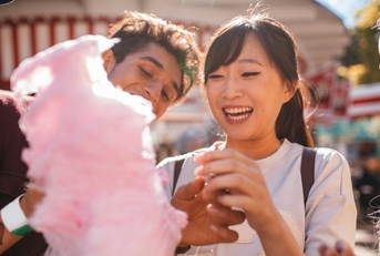 people sharing cotton candy