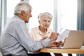  senior couple working on their finances