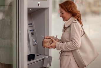 Woman using an ATM