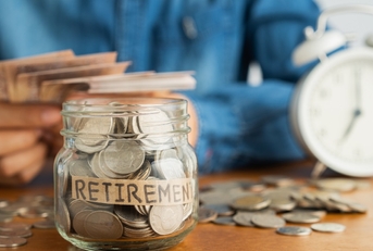 savings in jar with retirement label