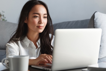 asian woman working remotely