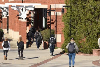 College students walk around campus