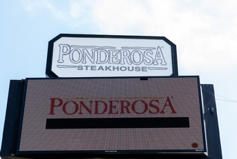 Ponderosa Steakhouse billboard Pearland texas