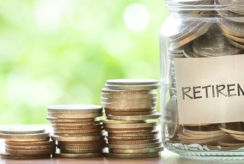 putting coins in glass jar