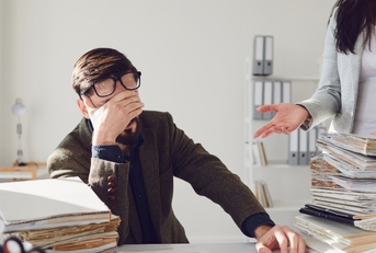 frustrated male employee with female boss