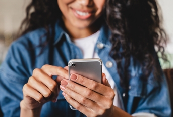 african-american woman using smart phone