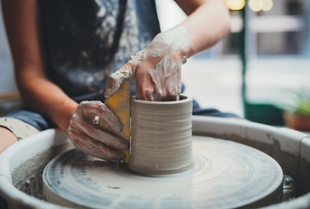 ceramics maker working with pottery