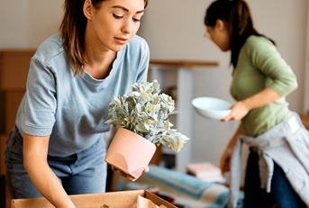 friends packing their belongings