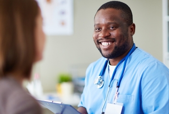 african American male nurse at work