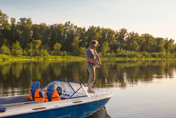  man on a motor boat fishing