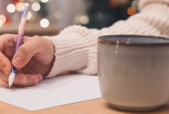 writing in notebook