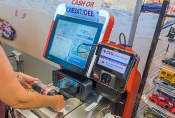 woman scanning items