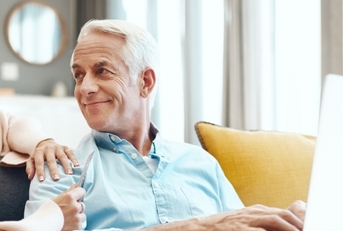 senior couple booking trip online