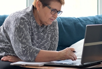 woman using laptop for websurfing