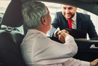 man buys car from dealer