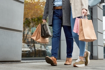 walking together with shopping bags