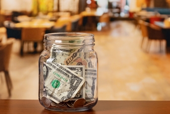 tip jar in restaurant dining room