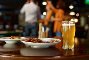 beer glass and fast food snack
