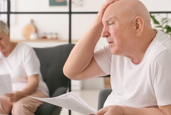 senior couple in debt