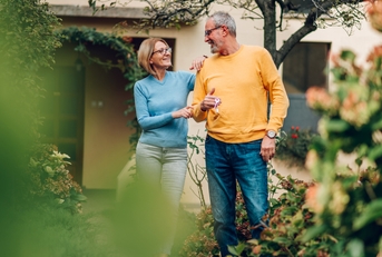 senior couple holding keys
