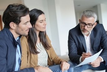 Couple with real-estate agent