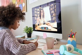 Online tutor teaching digital class