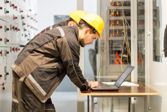 Maintenance engineers inspect relay protection