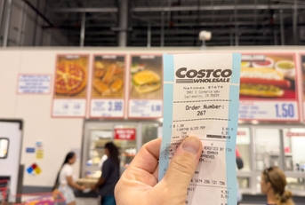 hand Holding receipt at costco food court
