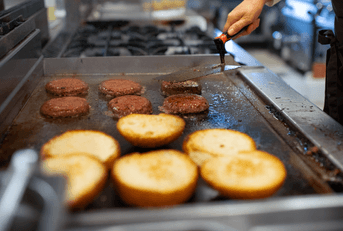 burgers on grill