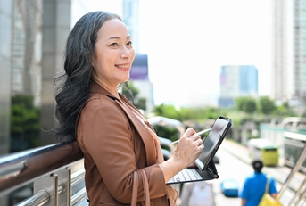 woman standing in a modern cityscape
