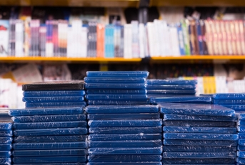 Stacks of new DVDs in store