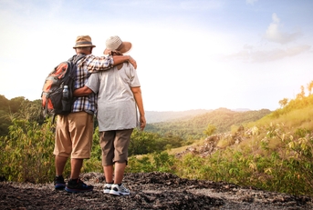 elderly couple hiking