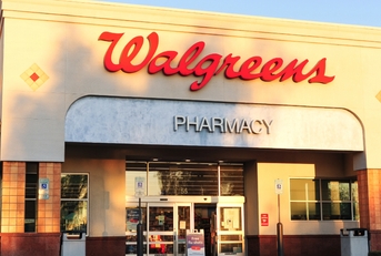 Storefront of a Walgreens Pharmacy building showing brand logo in Arizona